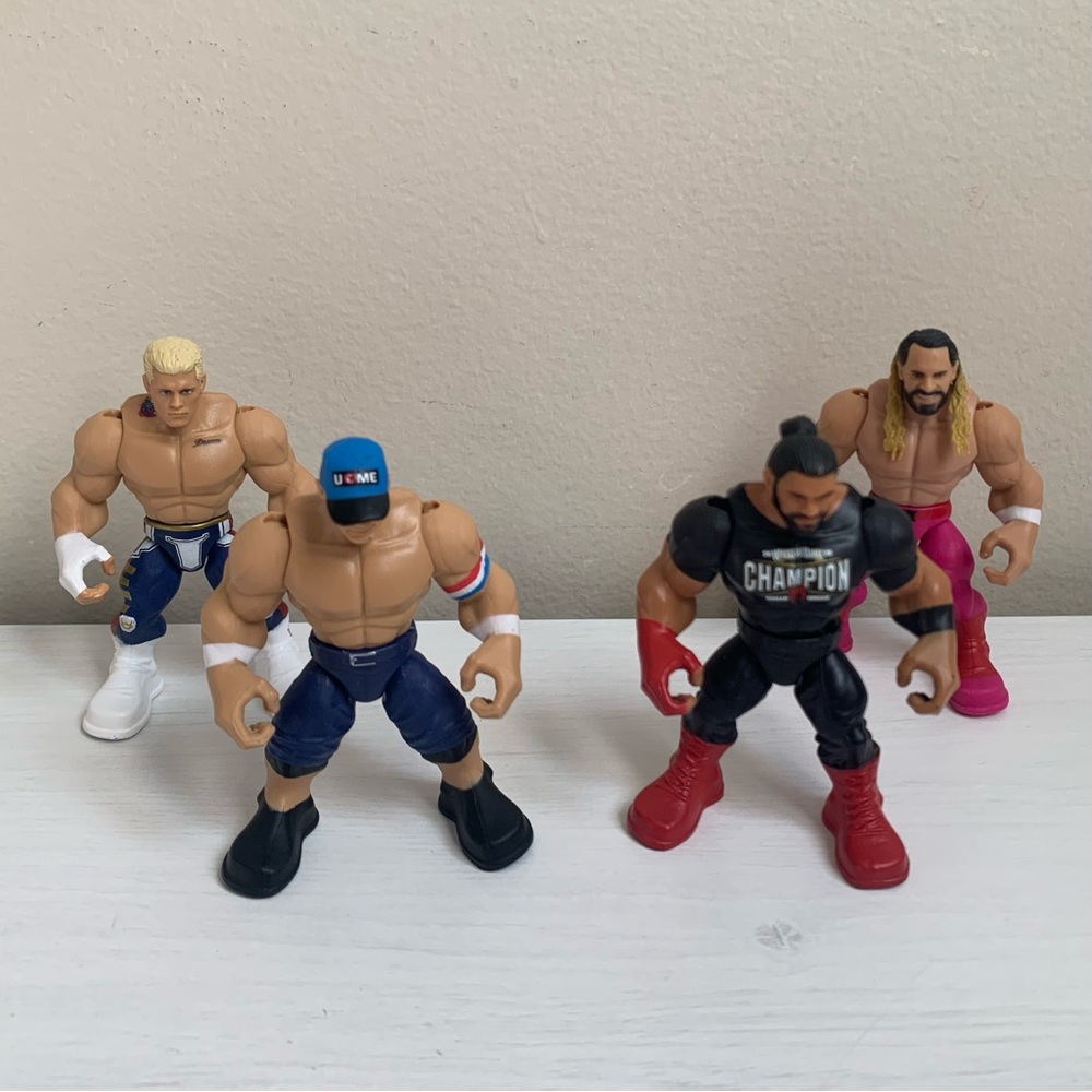 WWE Knuckle Crunchers Lot of 4 Figures Rhodes Cena Reigns Rollins Mattel 2023